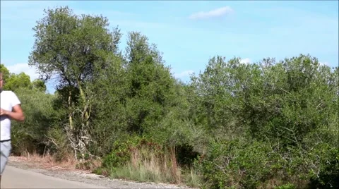 Jogging man drinking water Stock Footage 41699673