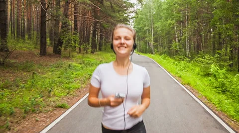 Jogging in park Stock Footage 26204587