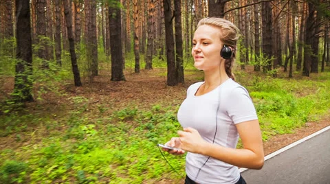 Jogging in park Stock Footage 26204701