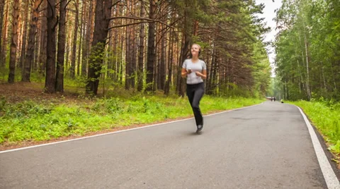 Jogging in park Stock Footage 27225923