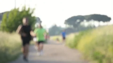 Jogging in the park (out-of-focus) Video stock 11132162