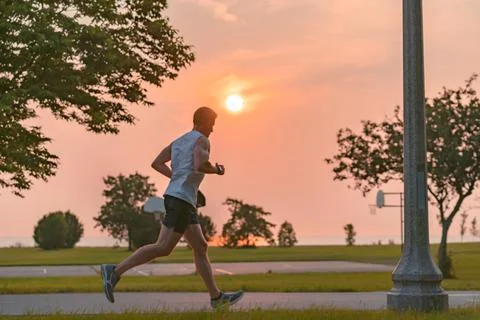 Jogging in the park Stock Photos