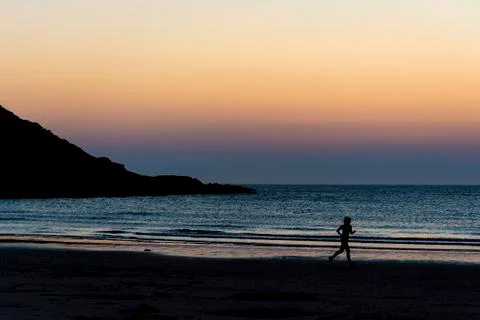 Jogging sunset Stock Photos