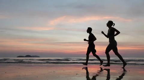 Jogging at sunset, workout Stock Footage 59738708