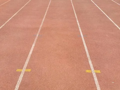 Jogging track in the stadium Stock Photos