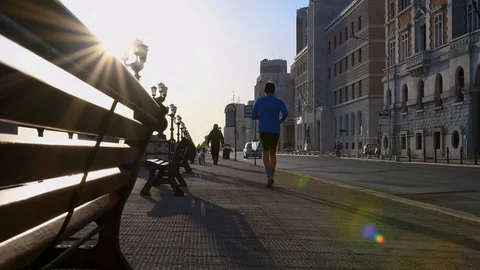 Jogging on the waterfront Stock Footage 106344456