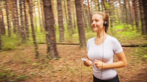 Jogging in wood Stock Footage 26217550