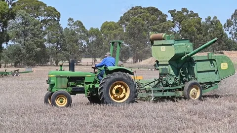 John Deere 42 Header demonstrating in a wheat field Stock Footage 300395050