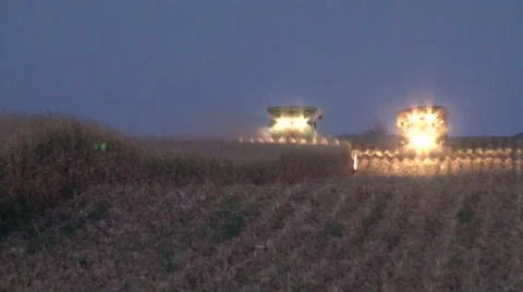 John Deere Combine and Grain Cart Night Shot Stock Footage 42310209