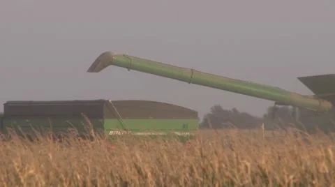 John Deere Combine and Grain Cart Stock Footage 42525287