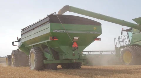 John Deere Combine and Grain Cart Rear View Video stock 65029130