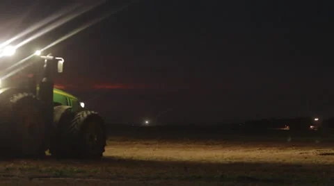 John Deere Grain Cart Rear View Night Footage - Wheat Harvest Stock Footage 65027331
