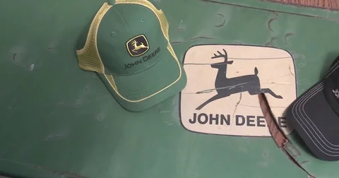 John Deere Logos - Old and New - Hats - Old Farm Equipment Stock Footage 79862856