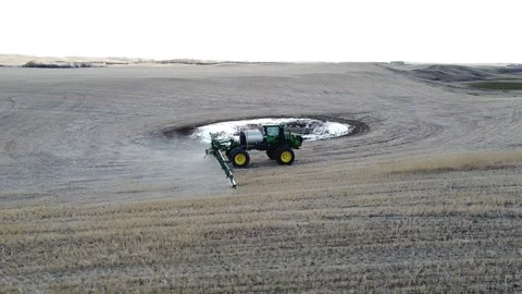 John Deere spraying field 1 Stock Footage 131904126