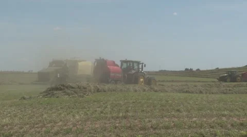 John Deere Tractor Bailing Far Back View Video stock 40453376
