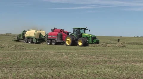 John Deere Tractor Bailing Turning Around Stock Footage 40460720