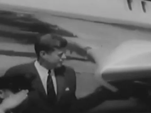 John Fitzgerald Kennedy visiting workers in factory Stock Footage 123795859