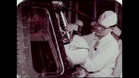 John Glenn climbing into space capsule aboard Mercury-Atlas 6 Stock Footage 262065167