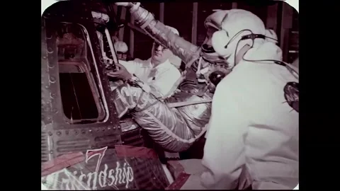 John Glenn climbing into space capsule aboard Mercury-Atlas 6 Stock Footage 262065172