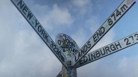 John O Groats sign post pull focus pan from left to right Stock Footage 104889390