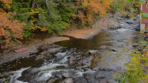 Johnson Vermont rapids on river by Power House Bridge in fall foliage in Vídeo Stock 37217293