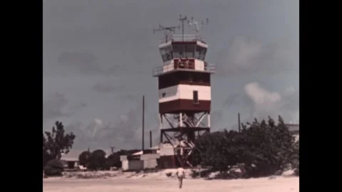 JOHNSTON ATOLL - 1958 - Engineers work in the control tower on JOHNSTON Atoll Stock Footage 340584014