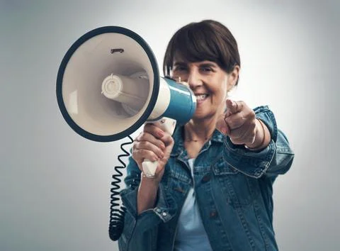 Join me on this great cause. Studio portrait of a senior woman using a megaphone Stock Photos