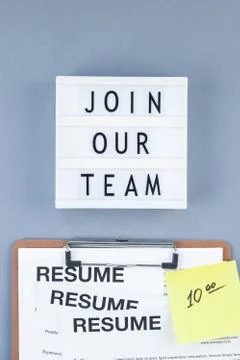 Join our team flat lay on blue background Foto stock