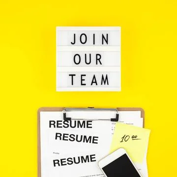 Join our team flat lay on yellow background Creative top view flat lay of ... Stock Photos