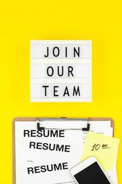 Join our team flat lay on yellow background Creative top view flat lay of ... Stock Photos