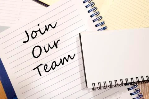Join our team write on notebook Stock Photos