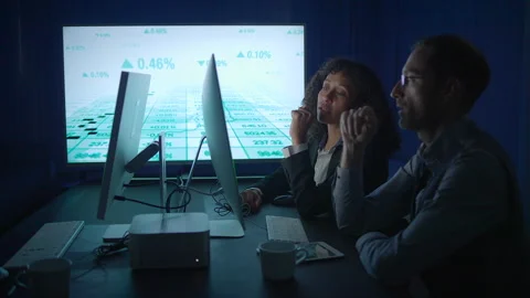 Join us for an evening of collaboration at a creative and productive office Stock Footage 294632123