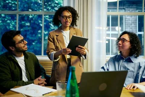 Join us for a productive collaborative business meeting featuring a diverse Stock Photos