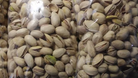 Join us as we explore the intricate process of pistachio harvesting in Stock Footage 292754655