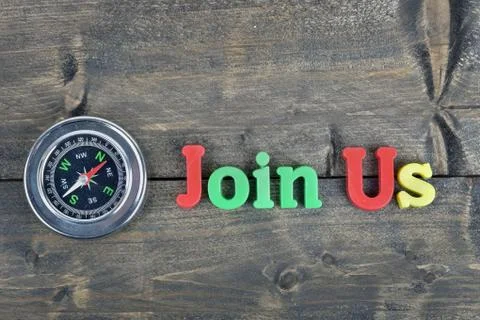 Join Us on wooden table 스톡 사진
