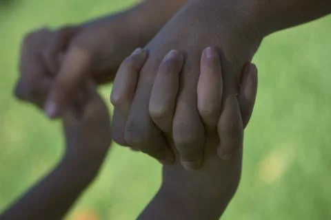 Joined hands Stock Photos