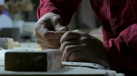 Joiner cleans piece of wood Stock Footage 59792771