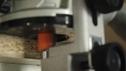 Joiner hands with milling router machine milling wood edge close up. Handmade. Stock Footage 178520027