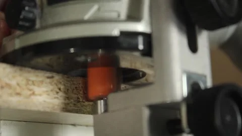 Joiner hands with milling router machine milling wood edge close up. Handmade. Stock Footage 243988680