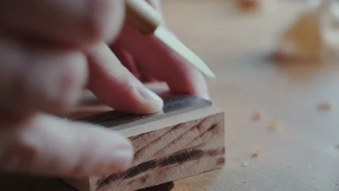 Joiner makes a mark with a knife Making handmade furniture Stock Footage 156500434