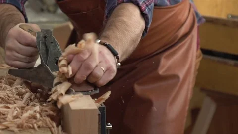 Joiner Planes Solid Wood in his Workshop Stock Footage 75141221