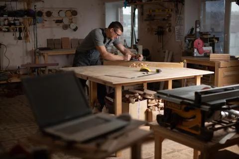 Joiner in the process of working Stock Photos