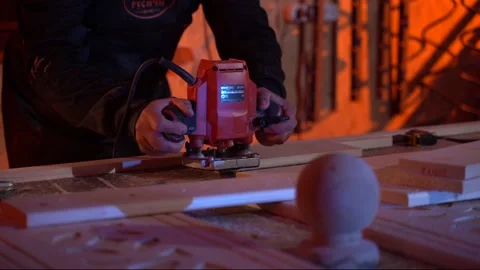 A joiner processes a part with a milling machine Slow Motoin Medium shot Stock Footage 120600906