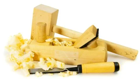 Joiner's tools (plane, mallet, chisel) on a white background. Stock Photos
