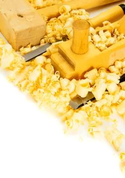Joiner's tools (plane, mallet, chisel) on a white background. Stock Photos
