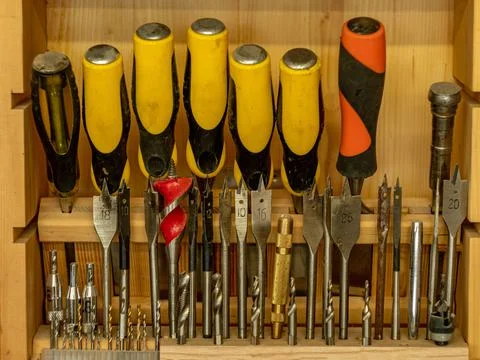 Joiner's tools. A set of chisels and a set of drills for woodworking. Stock Photos