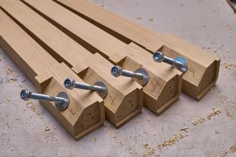 Joinery. Solid wood table legs building process. Wooden furniture manufacturing Stock Photos