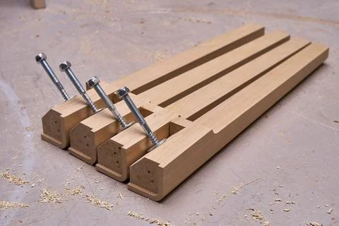 Joinery. Solid wood table legs building process. Wooden furniture manufacturing Fotos de archivo