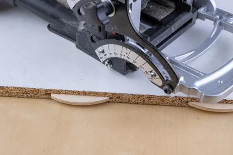 Joinery works in the workshop using sipes and a special milling machine. Stock Photos