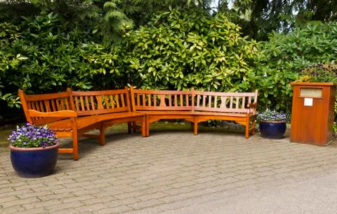 Joining cedar benches in rest area Stock Photos